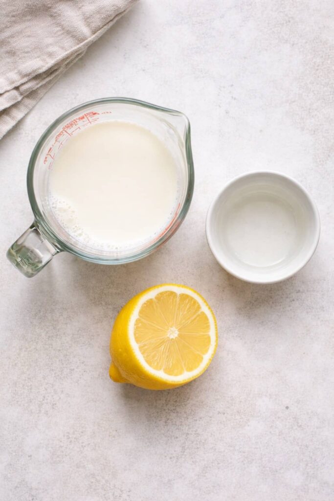 Milk and lemon juice ingredients for homemade buttermilk