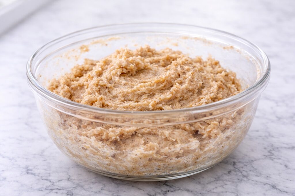 Snickerdoodle cookie dough in mixing bowl soft and smooth texture