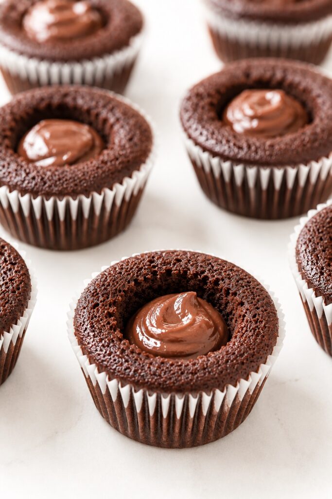 Chocolate Cupcakes Filled before Frosting